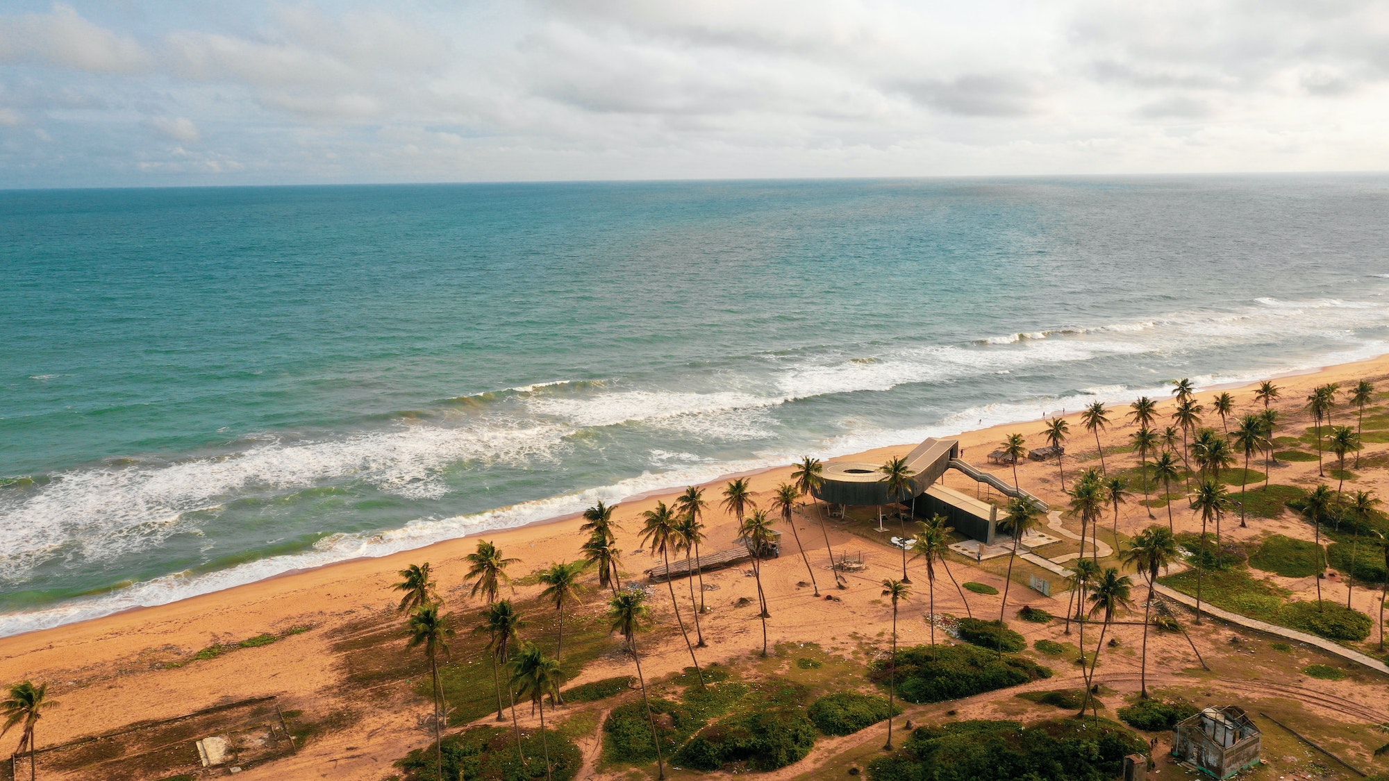 Aerial shot of the shore by the Atlantic Ocean captured in Badagry, Lagos State, Nigeria